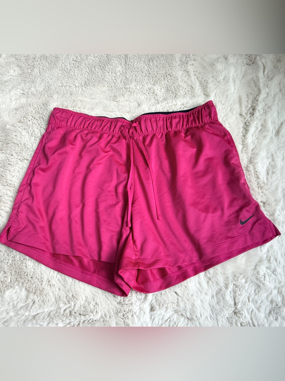 Nike Women's Pink Athletic Shorts with side pockets